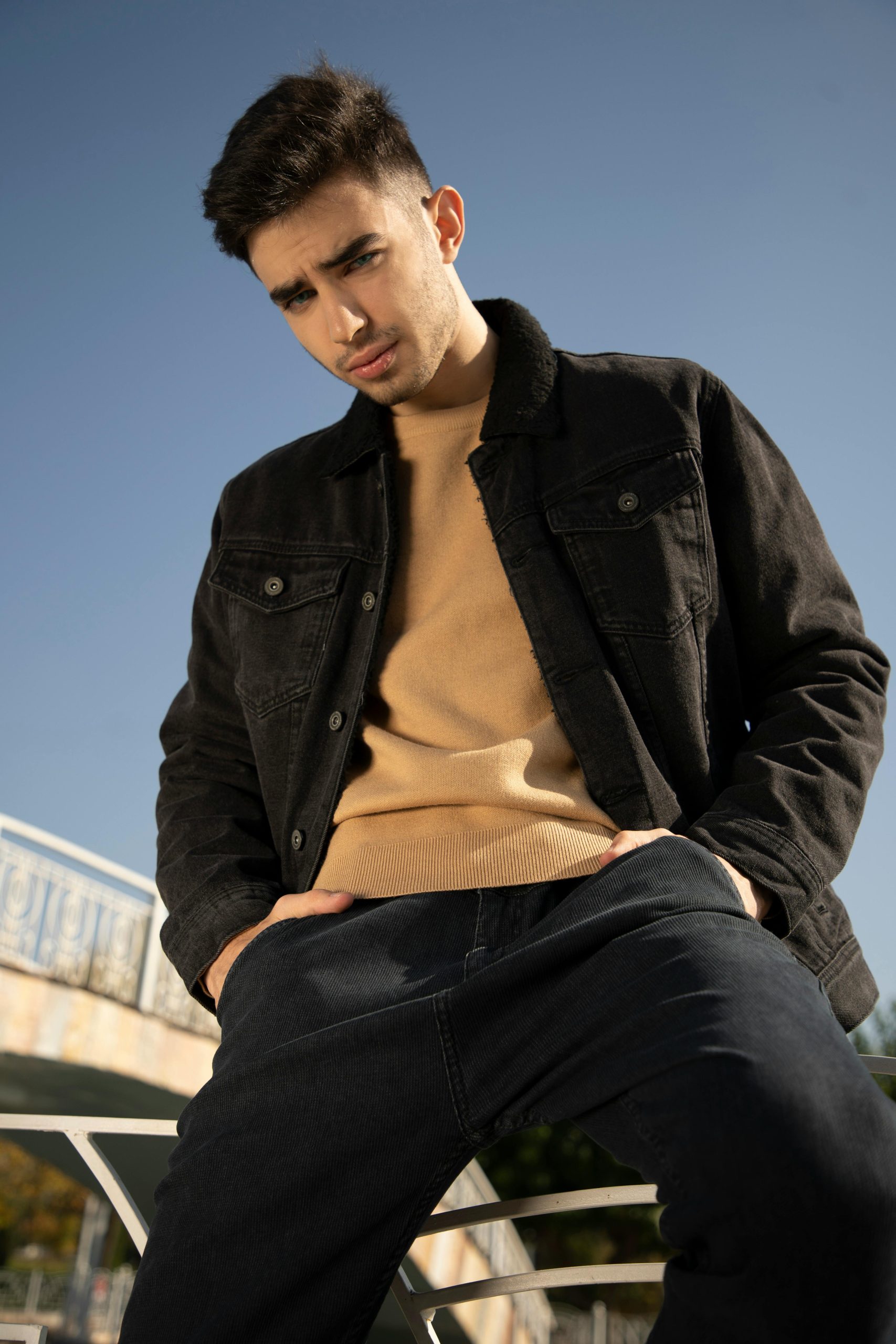 Portrait of a fashionable man in Tashkent, Uzbekistan, wearing casual outerwear.